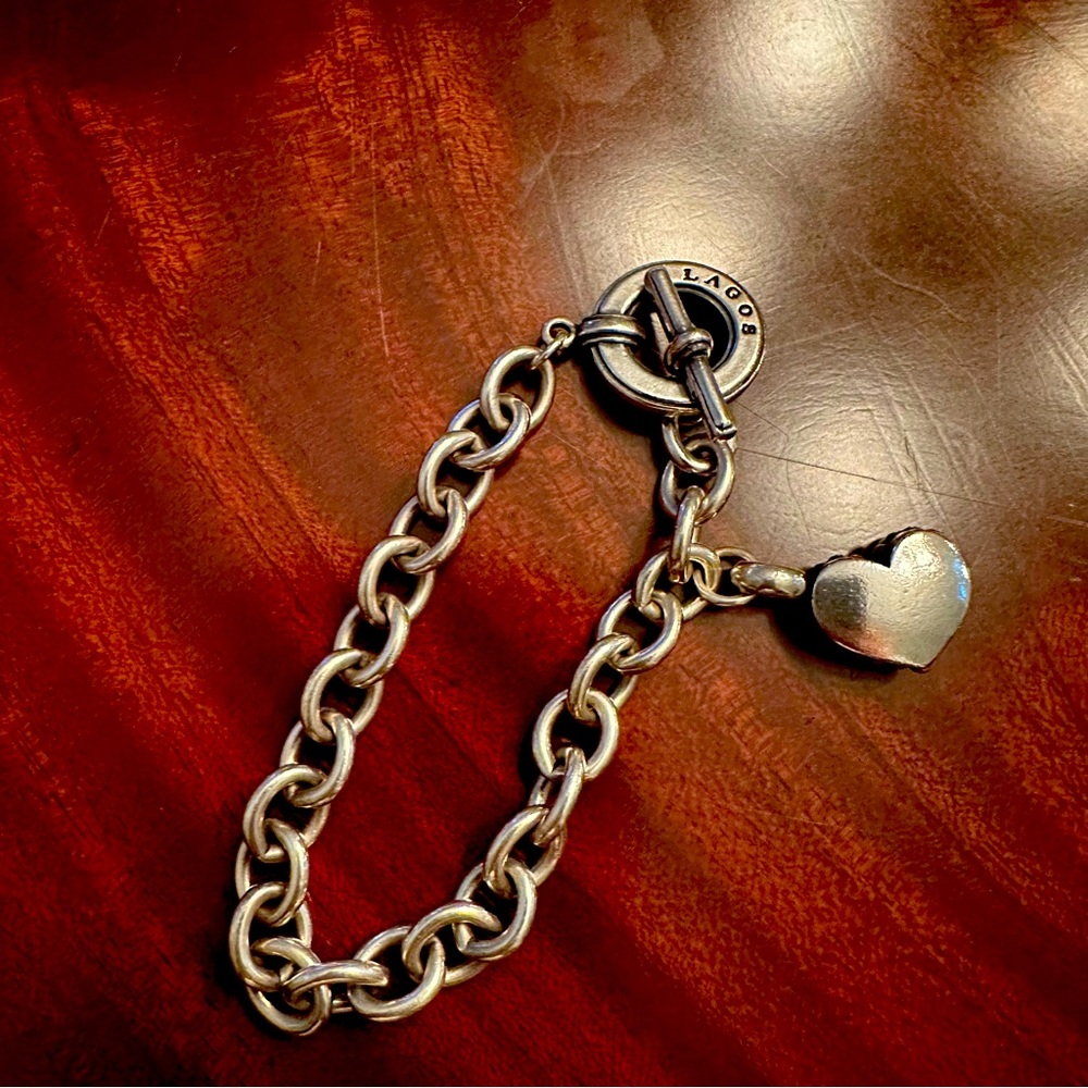 LAGOS  sterling silver bracelet with heart charm. Good preowned condition.